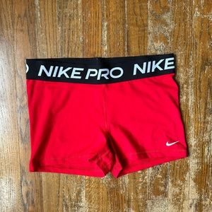 Red, LX, spandex from dicks sporting goods.